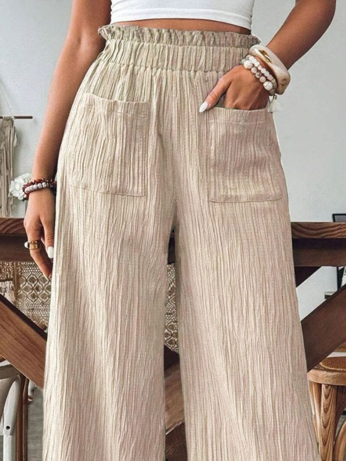 Tan textured gauze palazzo trousers with pockets and elastic waist