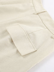 Buttoned vest and shorts set in cream cotton with a flap pocket detail.