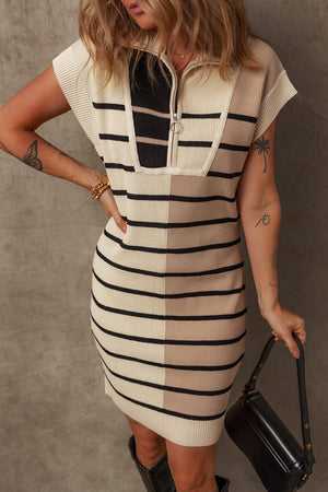 Colorblock ribbed mini dress with zip-neck and short sleeves in beige and black stripes.
