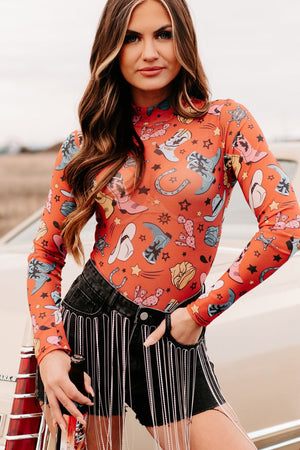 Orange mesh bodysuit with western print, long sleeves, and mock neck.