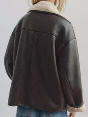 Oversized aviator jacket in chocolate brown with shearling trim and collar detail.