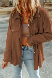 Brown textured shacket with raw edge detailing and button front