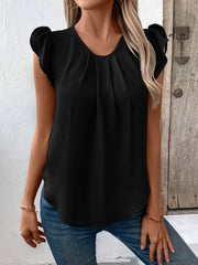 Black pleated yoke flutter sleeve blouse with a textured fabric.