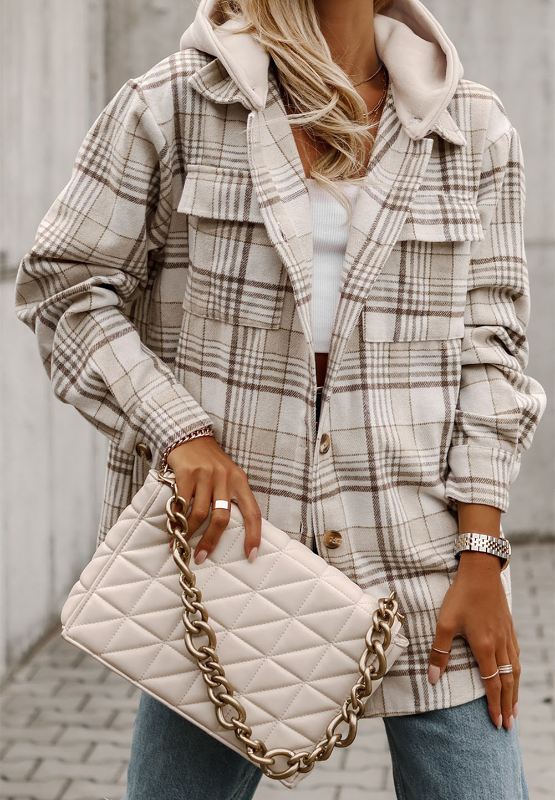 Oversized plaid shacket with attached hoodie and chest pockets.