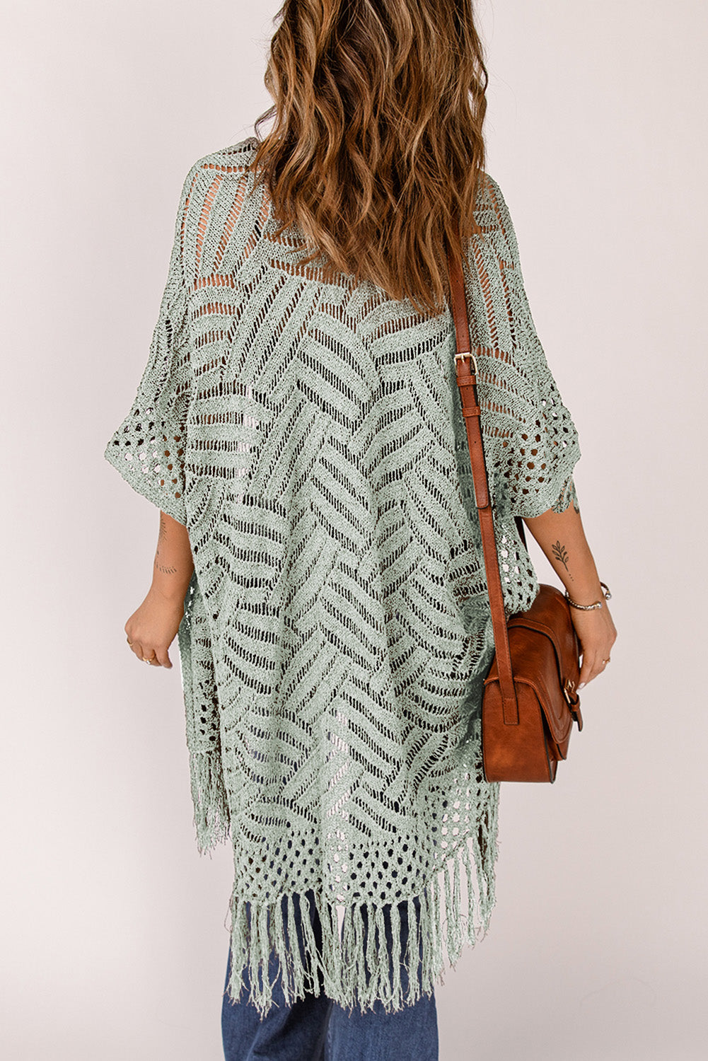 Sage open knit chevron fringe cardigan with short sleeves and boho styling.