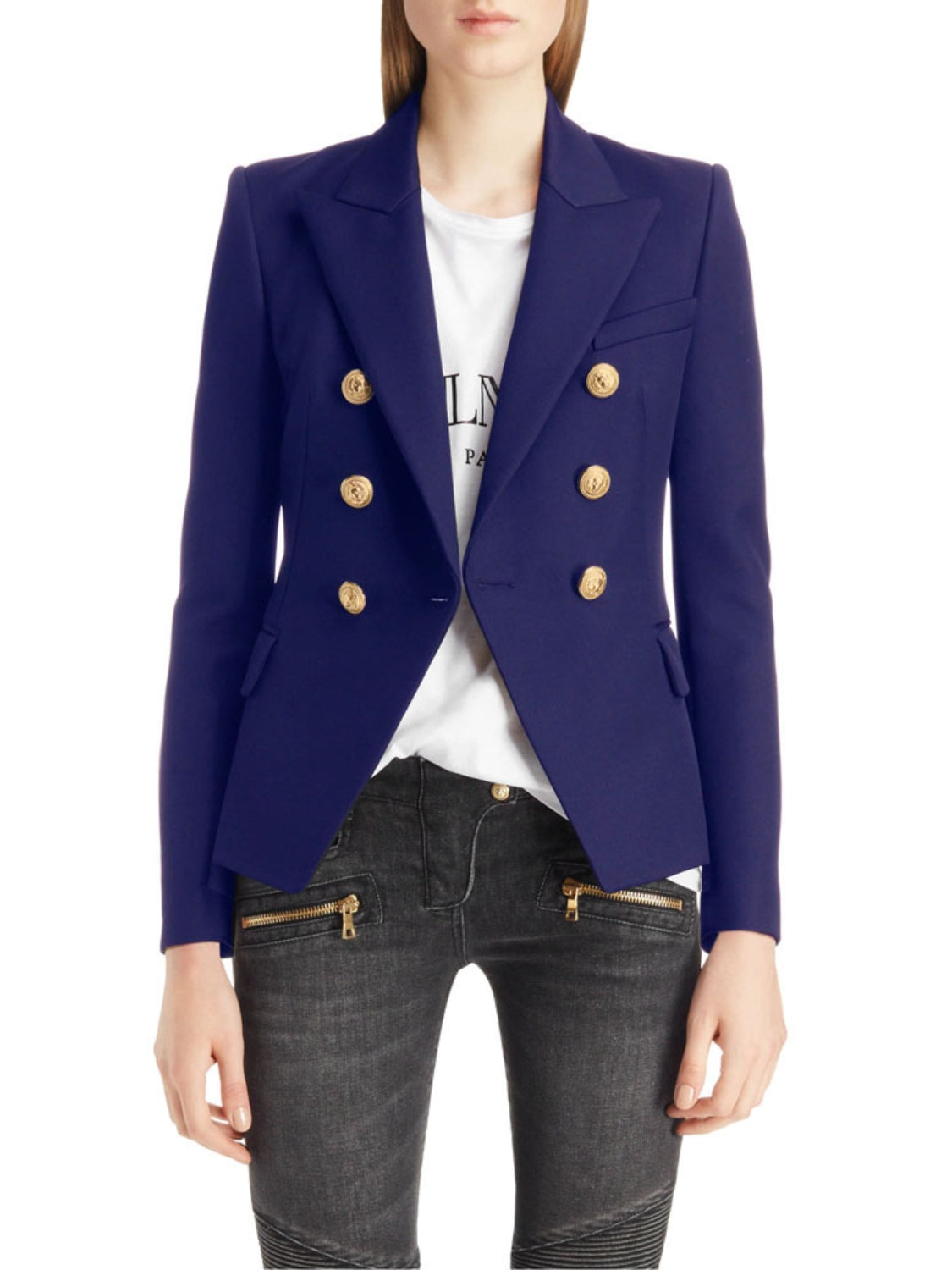 Navy double-breasted blazer with gold buttons and peaked lapels, worn open over a white t-shirt.