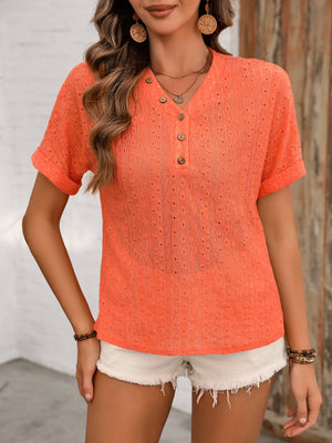 Eyelet Henley relaxed fit blouse in black, white, or orange-red.