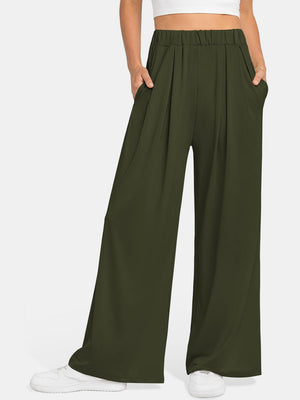 Army green pleated palazzo trousers with pockets and elastic waistband.