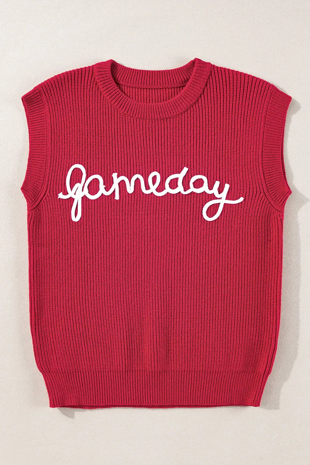 Burgundy ribbed knit vest with white "gameday" appliqué and crew neckline.