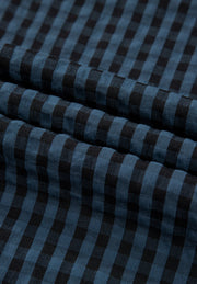 Textured dark blue gingham overalls with button detail
