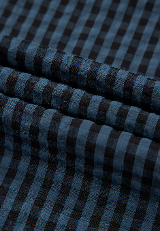 Textured dark blue gingham overalls with button detail