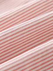 Pink and white striped cotton fabric detail