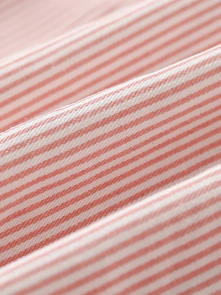 Pink and white striped cotton fabric detail