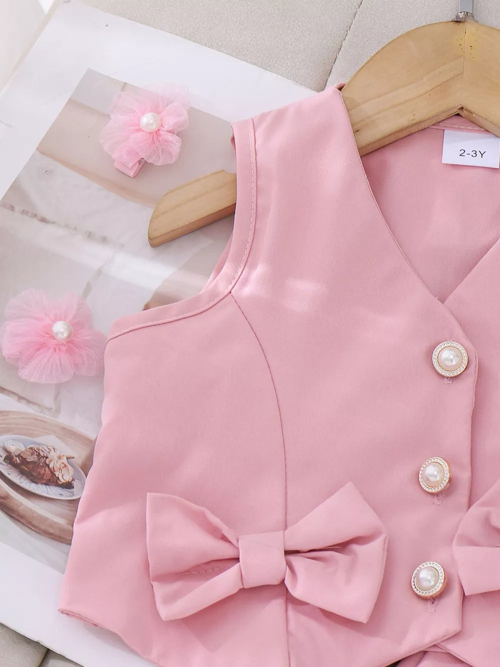Children's Bow Button Up Vest And Skirt Set in Pink, close-up detail