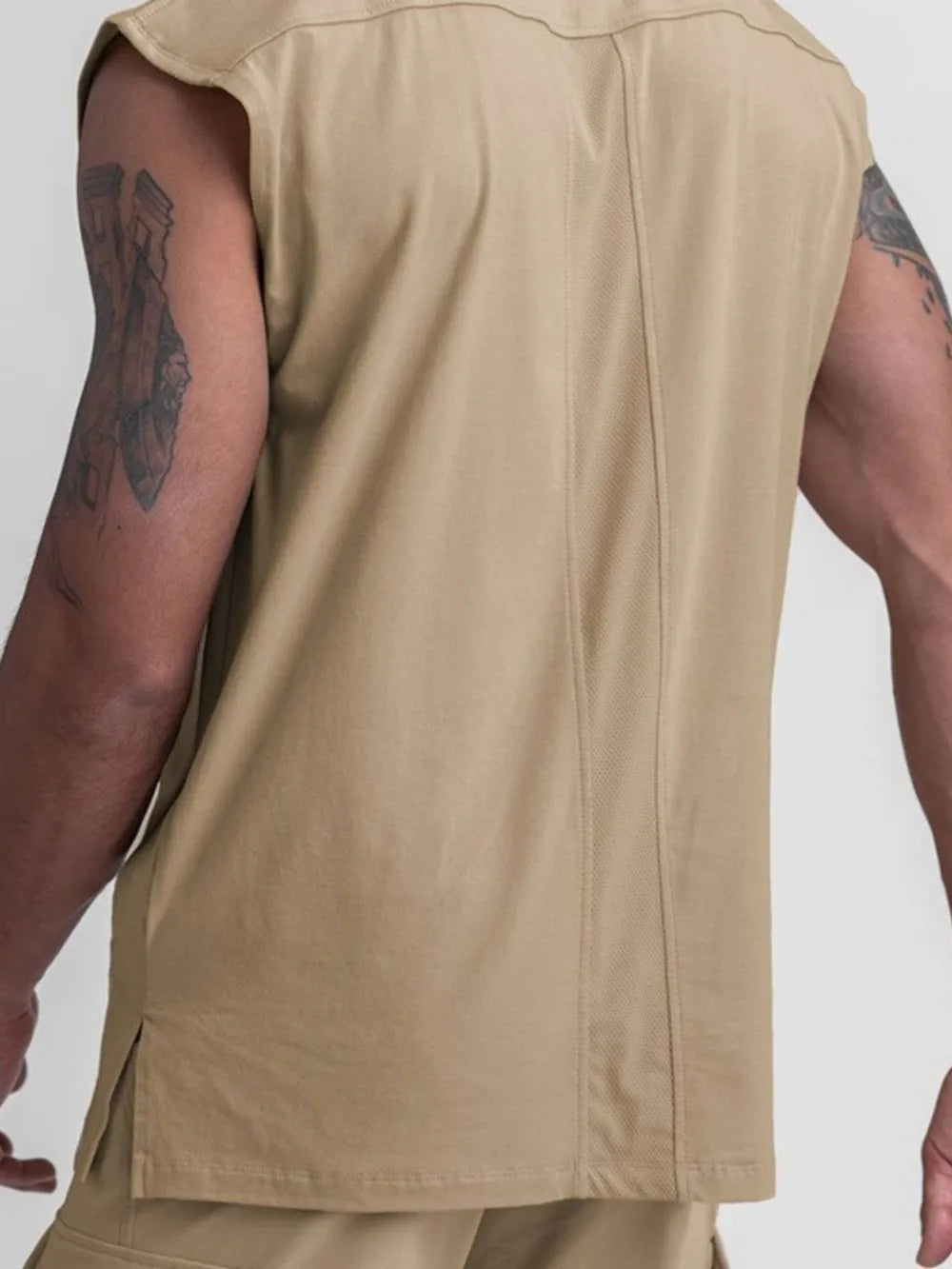 Khaki performance cut sleeveless tee with side vents and breathable mesh paneling.