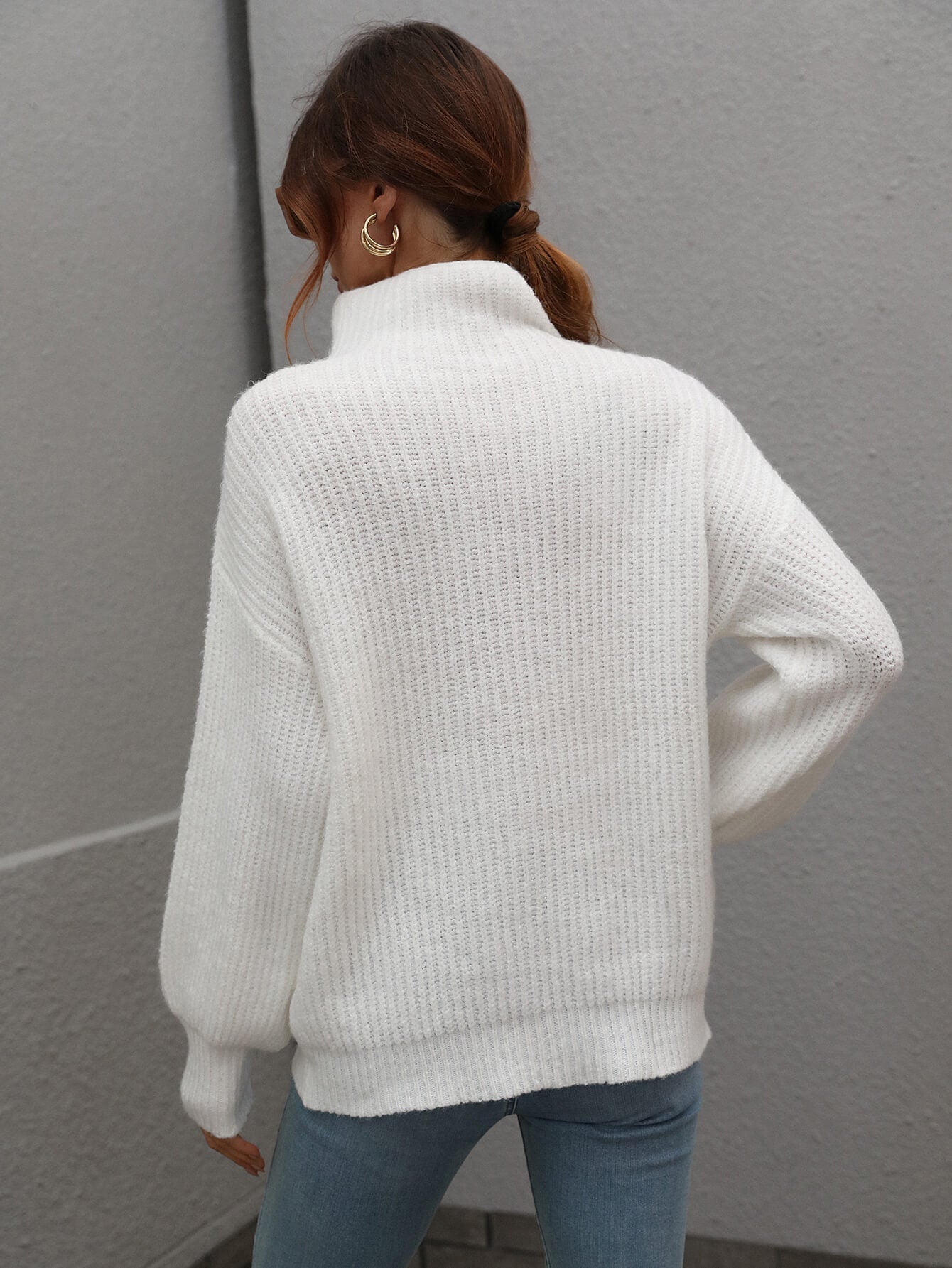 White ribbed knit turtleneck sweater with balloon sleeves