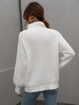 White ribbed knit turtleneck sweater with balloon sleeves