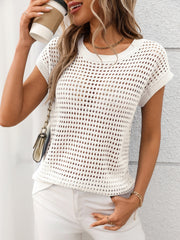 Ivory openwork knit crewneck sweater with short sleeves and a relaxed fit.