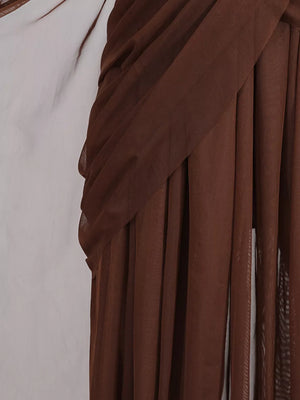 Brown draped one-shoulder maxi dress with sheer fabric detail.