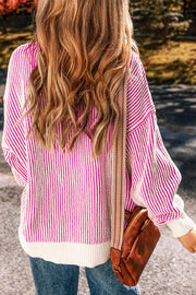 Hot Pink and white striped drop-shoulder knit sweater with a crew neck and ribbed hem.