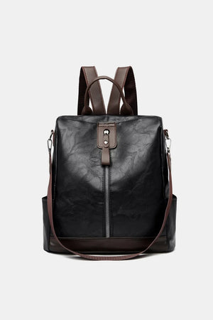 Black structured leather convertible backpack with brown accents and straps.