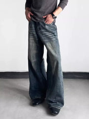 Men's blue distressed wide-leg denim jeans with a relaxed fit.