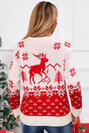 White acrylic knit sweater with red reindeer, snowflake, and tree Fair Isle pattern.