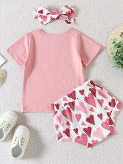Blush pink cotton tee and heart print shorts set with matching headband.