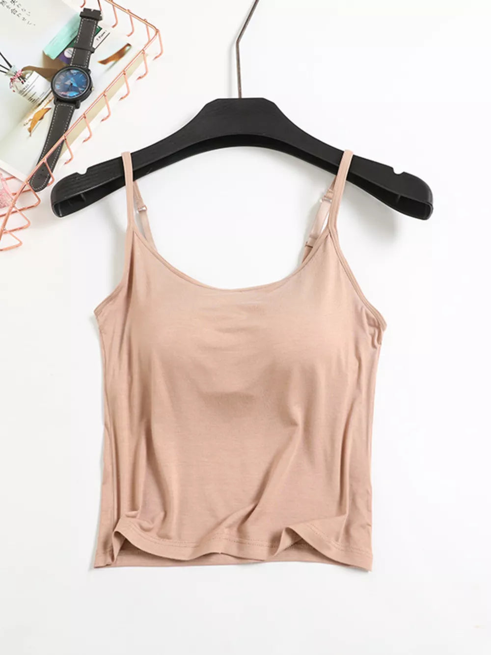 Beige cami with adjustable spaghetti straps and a basic, comfortable fit.