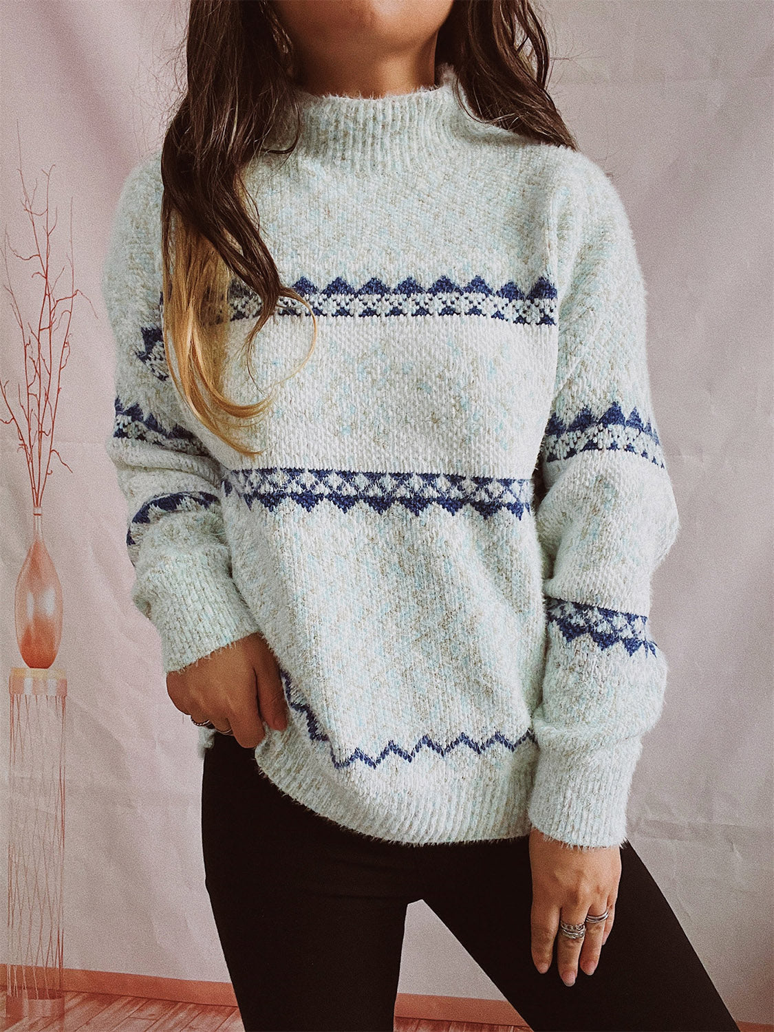 Geometric knit mockneck pullover in Misty Blue with navy geometric pattern, acrylic blend.