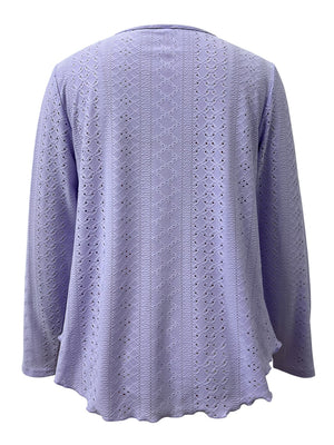 Lavender eyelet yoke blouse with scalloped hem and long sleeves.