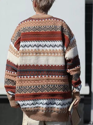 Geometric knit sweater in brown and gray with heritage-inspired pattern.