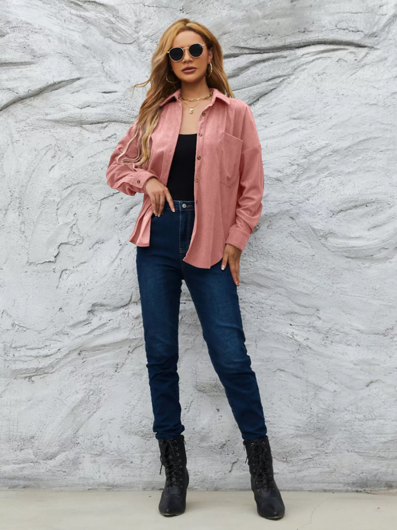 Pinkish corduroy button-up overshirt with a chest pocket and relaxed fit.