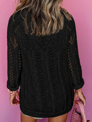 Black openwork chevron knit cardigan with long sleeves and a relaxed fit.