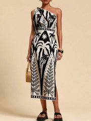 Tropical print one-shoulder midi dress in black and white with a defined waist and side slit.