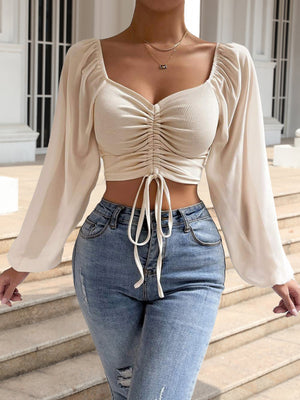 Ruched bodice puff sleeve crop top in Sand with drawstring detail and sweetheart neckline.