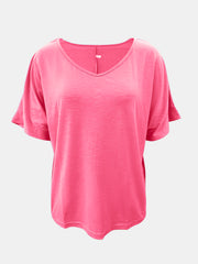 Relaxed V-neck tee in Strawberry with dolman sleeves and textured fabric.