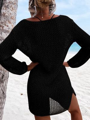 Black open-knit beach dress with long sleeves and side slit detail.