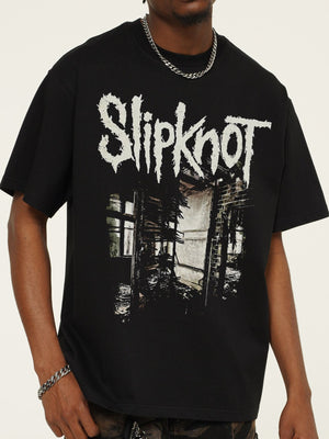 Men's black crew neck cotton t-shirt with distressed graphic print.