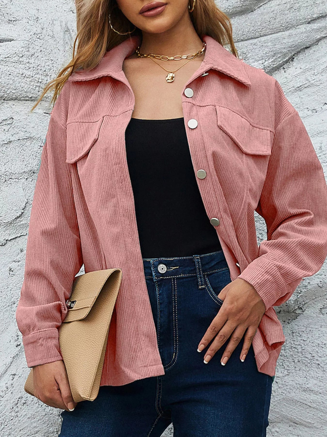 Pinkish textured corduroy button-up jacket with chest pockets and silver buttons.