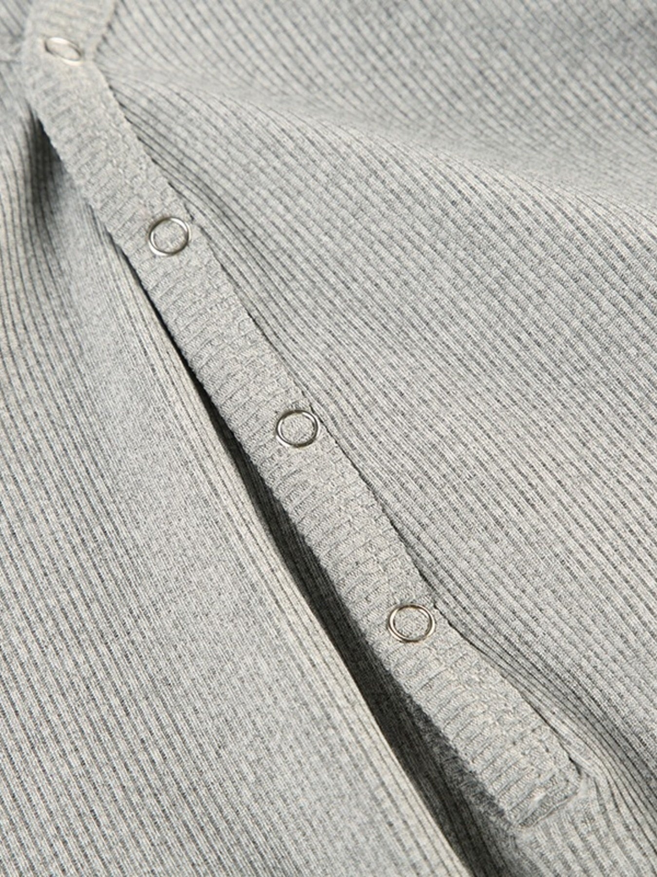 Gray ribbed long sleeve buttoned romper detail