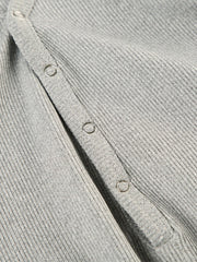 Gray ribbed long sleeve buttoned romper detail