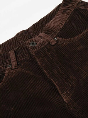 Brown corduroy joggers with button fly and adjustable waist detail.