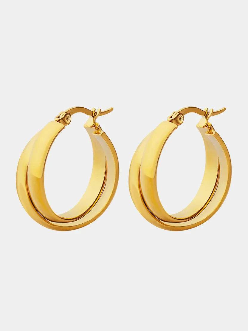 Gold double-band hoop earrings with a sculpted, polished finish.