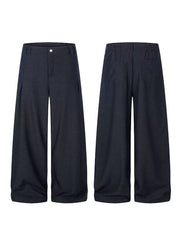 Relaxed fit dark heathered sweatpants with wide legs and front pleats.