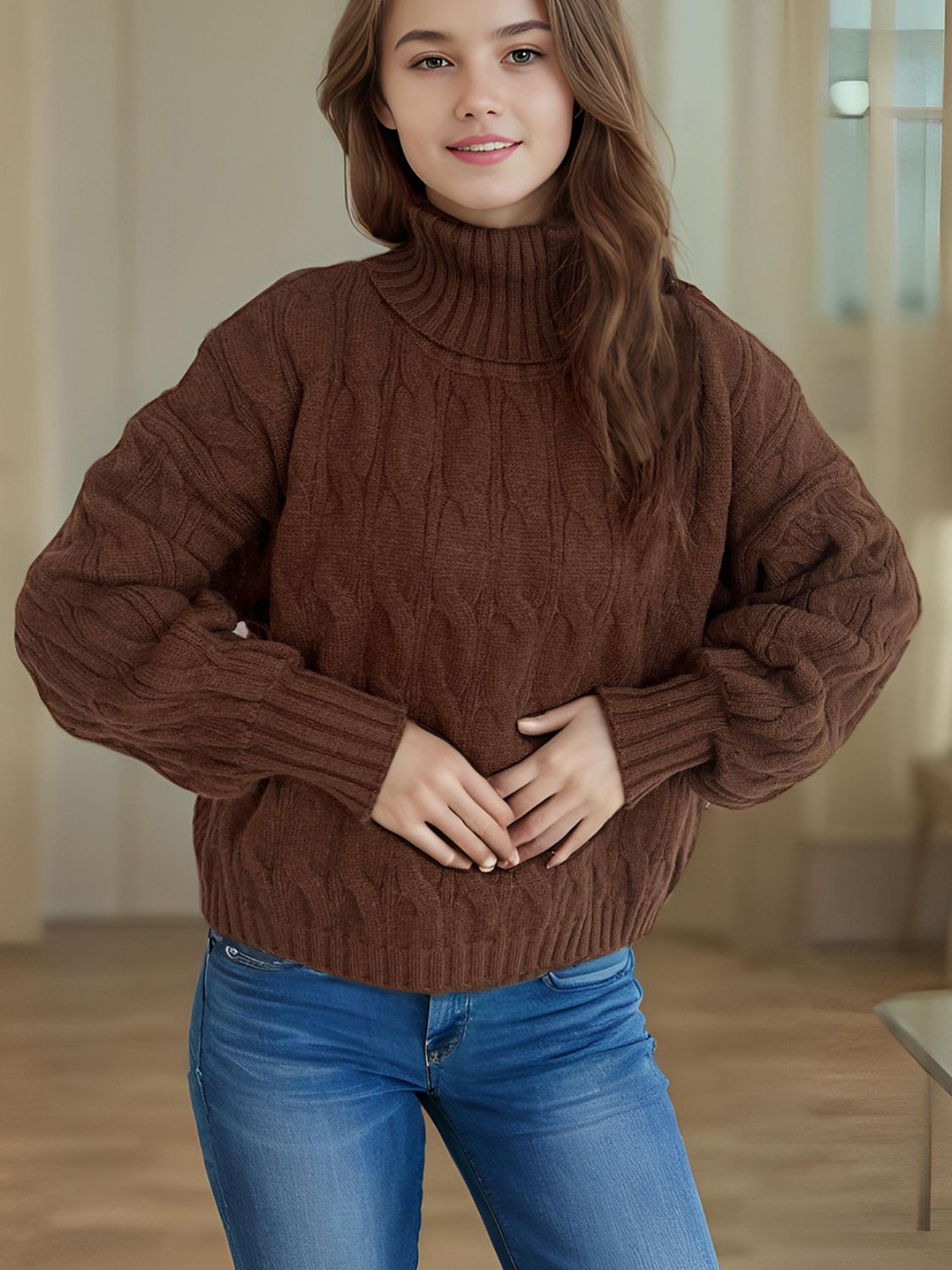 Oversized chocolate brown cable knit turtleneck sweater with balloon sleeves.