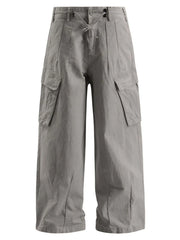 Light gray relaxed fit drawstring cargo pants with flap pockets and wide legs.