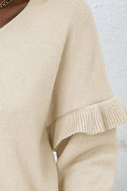Light yellow knit v-neck pullover sweater with ruffled sleeves.