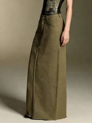 Army green cotton maxi denim skirt with raw hem and button closure.