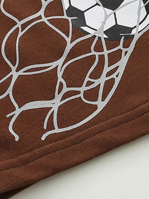 Brown cotton baby t-shirt and shorts set with soccer ball graphic and net detail.